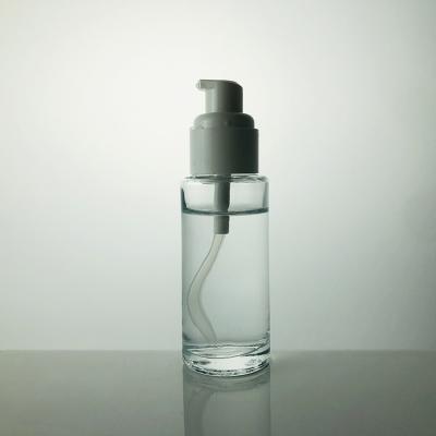 China Beverage 50ml 100ml Clear Spray Glass Perfume Bottle With Atomizer Cap for sale