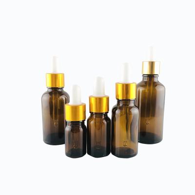 China Personal Care Amber Color 30ml 50ml 100ml Essential Oil Glass Bottle With Dropper for sale