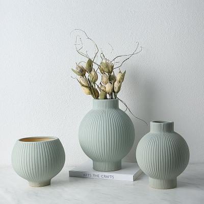 China Nordic Europe Morandi Mint Green Ceramic Small Vase Minimalist Tabletop Decorative Flower Vase For Home Decor for sale