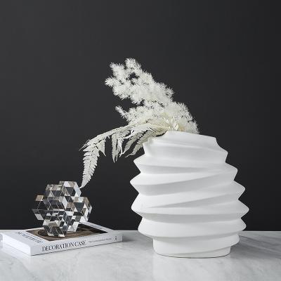 China Modern Interior Decorations Home Trends Circle 2021 Minimalist Handcrafted Ceramic Irregular Vase for sale