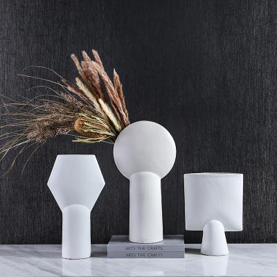 China Modern interior decorations 2021 new abstract ceramic flower decor white vases for home decor hand made for sale