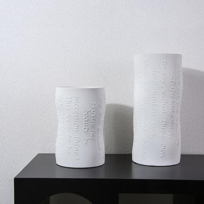 China Modern home decorations 2021 new European style vaseworm white ceramic vases premium home decoration for sale