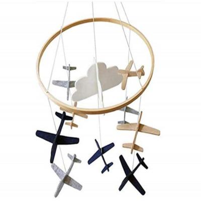 China Wholesale Eco - Friendly Airplane Clouds Moon Stars Crib Hanging Toys Wind Bells for sale