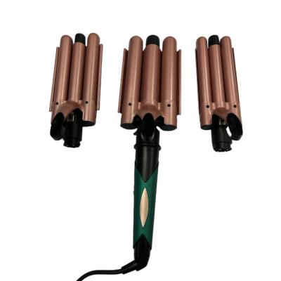 China Interchangeable curling iron interchangeable hair straightener curling iron Newest Automatic Rotating Curling Hair With 3 Barrels for sale