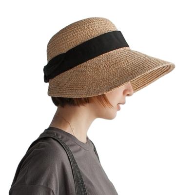 China Large Brim Bucket Hat Outdoor Women Character Summer Leisure Vacation Travel Sun Hat Female Bow Retro Raffia Hat for sale