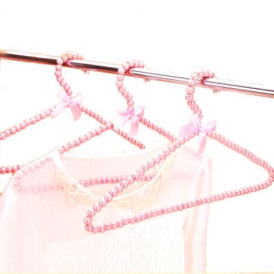 China Wholesales CLASSIC 40cm Multiple Color ABS Coat Hanger Bra Hanger Holder Pearl Girls Kids Plastic Fancy Clothes Kids for sale