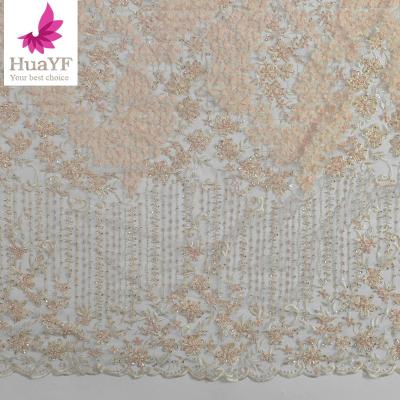 China Viable Handmade Pearls Sequins 3d Chiffon Flower Beaded Lace Net Laces Bridal Wedding Dress Fabric HY1270 for sale