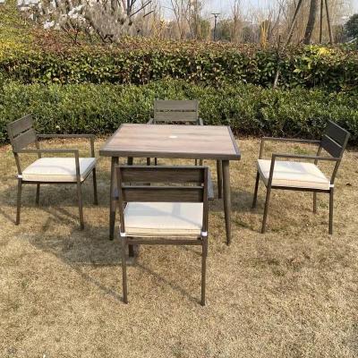 China New Design Steel Modern Luxury Garden Furniture Park Chair Cafe Dining Table Courtyard Five Piece Set for sale