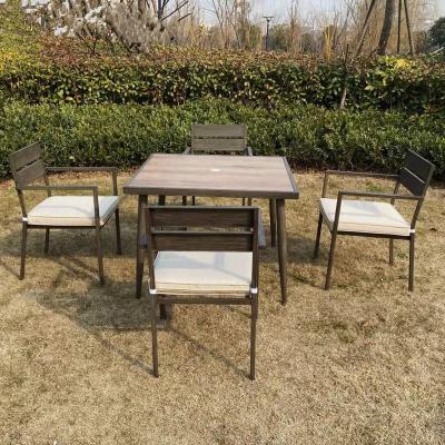 China New Design Steel Modern Garden Furniture Park Chair Cafe Dining Table Courtyard Five Piece Set for sale