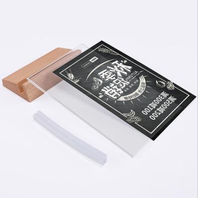 China Magnetic Tube Shooting Exquisite Wooden Low Table Plexiglass Test Magnet Menu Sign Holder Rotating Acrylic Holder for sale