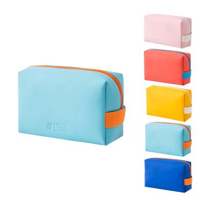 China Fashion Cute Waterproof PU Candy Colors Makeup Bags Portable Toiletry Storage Bag Women Travel Cosmetic Bag for sale