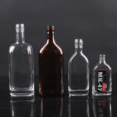 China Beverage Custom Design Different Types Spirit Bottle Glass Whiskey Bottle Different Size Factory Price for sale