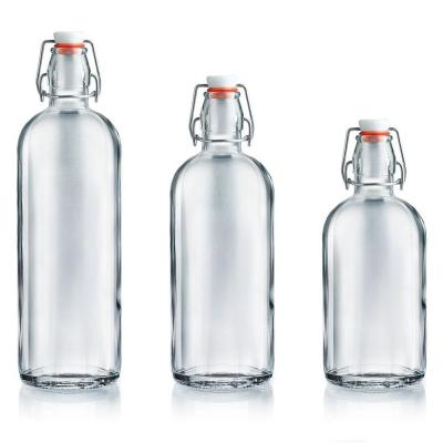 China Beverage Bottle Spirit Bottle Beverage Bottle Customized Factory Price With Swing Cap for sale