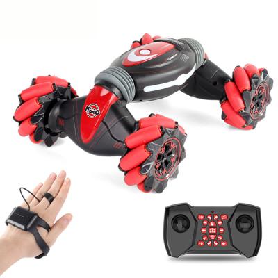 China 2.4g Remote Control Car 360 Gesture Hand Stunt Rc Car Double Side Rolling Toy for sale