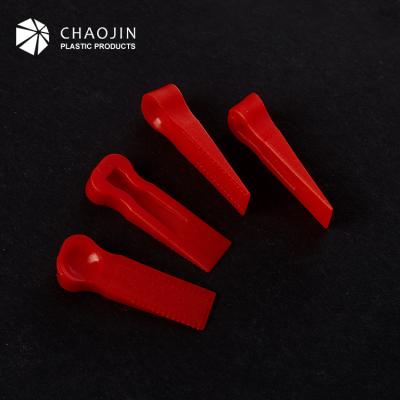 China Smooth Exterior Red Ball Wall Tile Head Wedge for sale