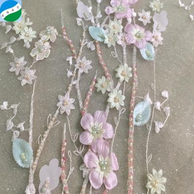 China Amazing High Quality Sustainable 3d Running Lot Flower Beads Embroidery Lace Fabric For Wedding for sale