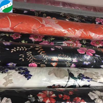 China Flame retardant hot sale woven print satin with spandex stocklot fabric in china for sale