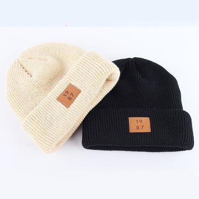 China COMMON Customized Winter Hats OEM Knitted Beanie Skull Hat for sale