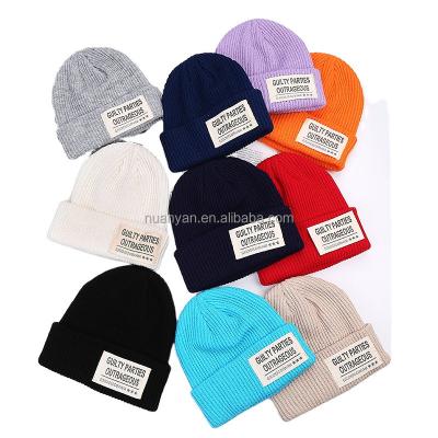 China Autumn Winter Keeping Warm Soft COMMON Knitted Beanie Hats Cheap Label Beanie Simple Custom Made Hat for sale