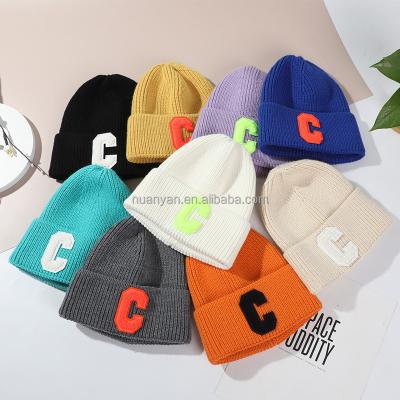 China COMMON Hot Sale Winter Fluffy Customize Embroidery Elastic Patch High Slouchy Beanies Hat Knitted Hats For Unisex for sale