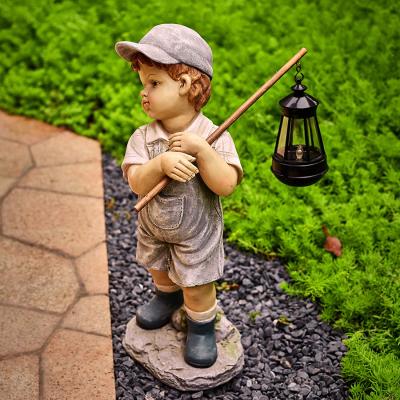 China Europe Garden Statue Boys With Solar Lantern Resin Crafts And Gifts Polyresin Sculpture Resin for sale