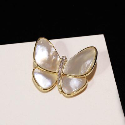 China Women luxury copper brooch with new color brooch manufacturers direct selling conch butterfly brooch for sale