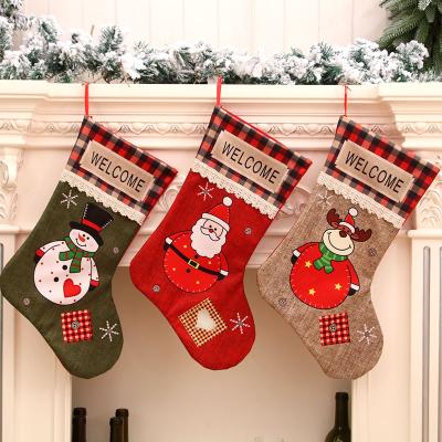 China Happy New Year Christmas Fashion Felt Canvas Sack Woven Christmas Socks Decoration for sale