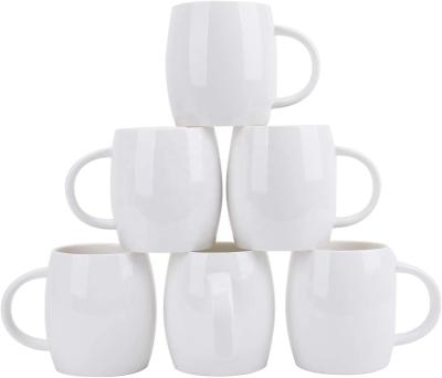 China Sustainable 14oz Stoneware Ceramic Belly Shape White Coffee Mugs With Customized Design For Wholesale for sale