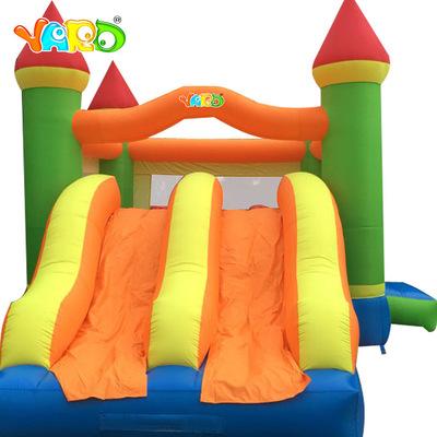 China Outdoor Residential Double House Slide Inflatable Air Jumper Bouncer With Blowers for sale