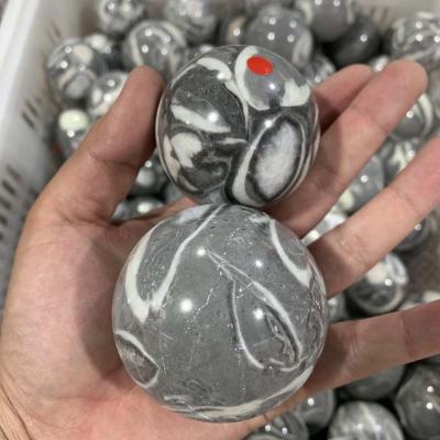 China China Wholesale Natural Crystal Quartz Shell Fossil Sphere Thousand Eye Stones For Home Decoration Gift Crafts for sale