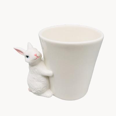 China Wholesale Ceramic Christamas Decoration Easter Mug With Rabbit Mug Handle China White Ceramic Mug for sale