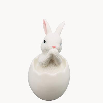 China Easter Home Decoration Personalized Ceramic Rabbit Posing In Ceramic Easter Decorated Christmas Sack for sale