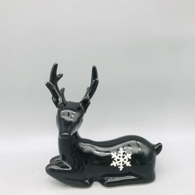 China Europe Top Quality Black Ceramic Snowflake Decor Kneeling Deer for sale