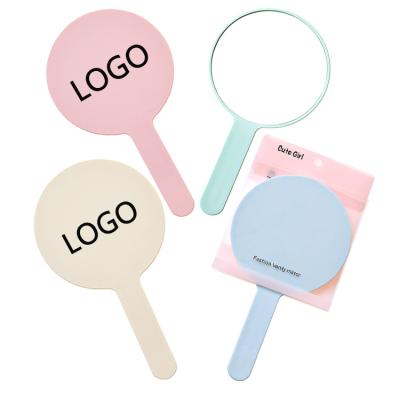 China Custom Logo Portable Hand Held Mirror Private Label Round Hand Held Cosmetic Mirror for sale