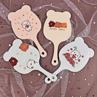 China Custom New Cosmetic Mirrors Bear Shape Custom Hand Mirror With Handle for sale