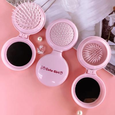 China Mini foldable detangling brush straight hair comb massager and woolly hair brush detangling custom logo for sale