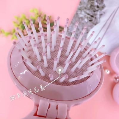 China Small Travel Collapsible Plastic Foldable Pocket Comb Hair Brush with Ladies Makeup Mirror for sale