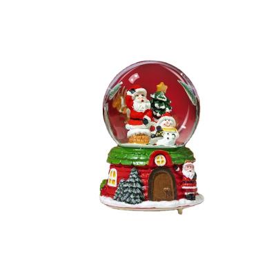 China Artificial Snow Globe Music Box Crystal Ball Resin Christmas Gift Musical Crystal Ball For Home Decor for sale