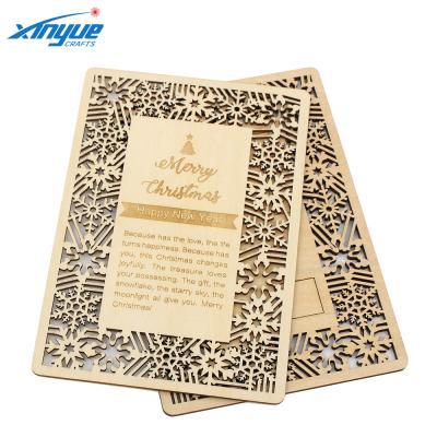 China Worldwide Creative Design Laser Cutting Wooden Hollow Christmas Greeting Postcards for sale