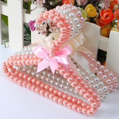 China G01148 Sustainable Pet Supplies Shop Wholesale Cat Dog Clothes Pearly Small Hangers for sale