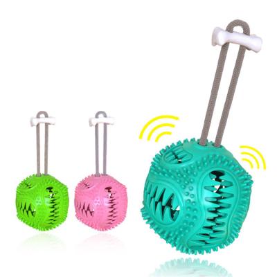 China Viable Dog Bell Toy Ball Chewing Cord Leakage Interactive Pet Toy Dog Toy for sale