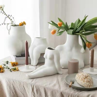 China New Cute Shaped Ceramic White Unglazed Ceramic Vase End Women's Vases Office Home Decoration for sale