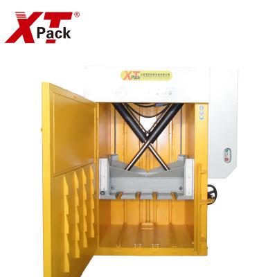 China Recycling Safe Small Cross Cylinder Cardboard Baler Machine For Cardboard for sale