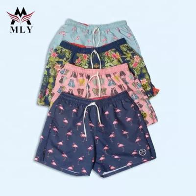 China Breathable 2023 OEM custom waterproof men beach shorts hot sale swimming trunks for sale