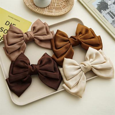 China Deco Girls Fabric Hair Grips Sweet Hair Accessories Coffee Color Large Bow Hairpin Metal Spring Hair Clips For Women for sale