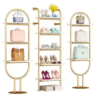 China 2021 Best Store Furniture Metal Display Rack Stainless Steel Gold Shoe Bag Display Rack Multilayer Glossy Selling Rack for sale