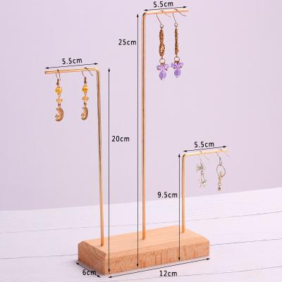 China Modern Luxury Solid Wood Display Devices Metal Stand Jewelry Display Set for sale