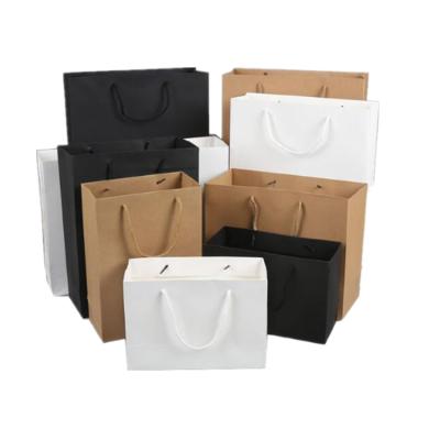 China Recycled Materials Factory Outlet Sale Eco-friendlypaper Luxury Shopping Bags In Brown White Black Kraft Paper Color With Custom Logo for sale