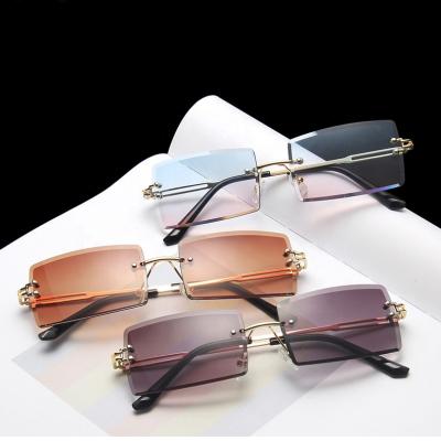 China UV400 / Polarized Hot Sale Fashionable Wholesale Women Shades Shape Small Rectangle Rimless Sunglasses For Ladies Men for sale