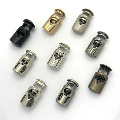 China Newest Metal Spring Rope Lock Stopper Elastic Toggle Stopper Silver Nickel Free Adjustable Cord Buckle for sale